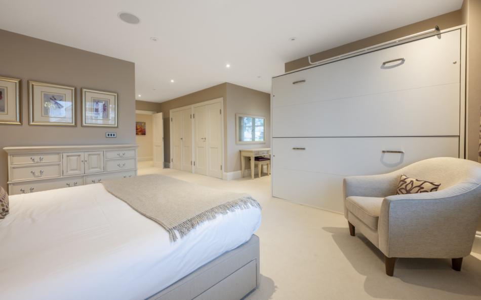 Light and airy bedroom at Grasmere Beach House