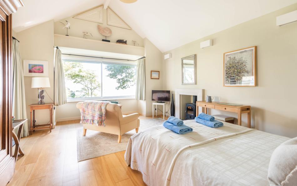 The Master bedroom is spacious and comfortable with fabulous views at Fairyfield
