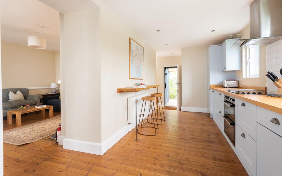 kitchen to the lounge at 1 Ivy Cove