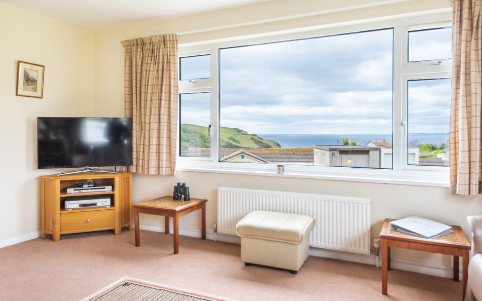 The lounge sea views at Devon House