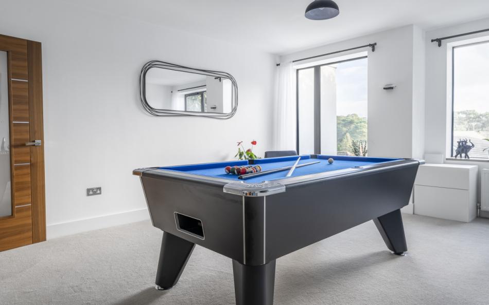 games room with pool table at Santorini House