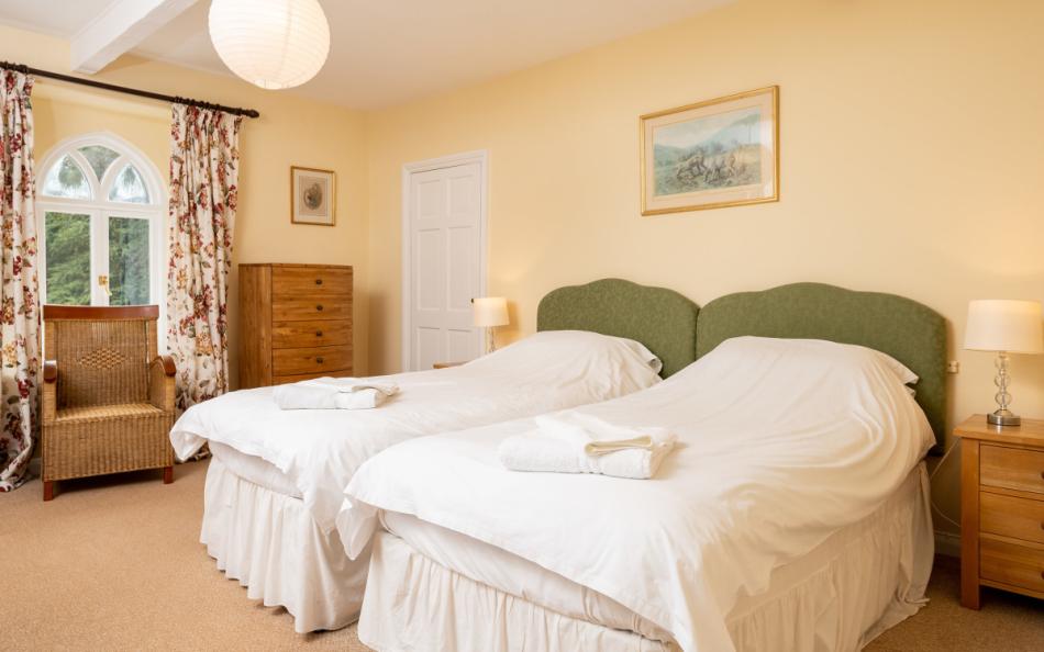 Bedroom one at Holne Chase Carriage House