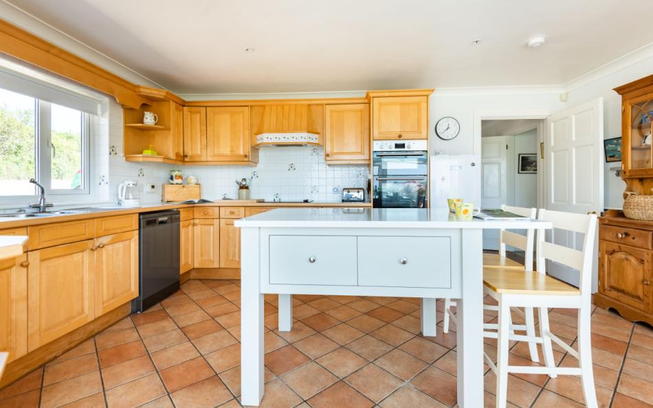Breakfast bar within the kitchen at Double Gates 