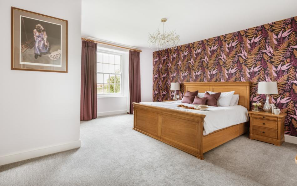 Spacious bedroom 1 at Bigbury Court Farmhouse