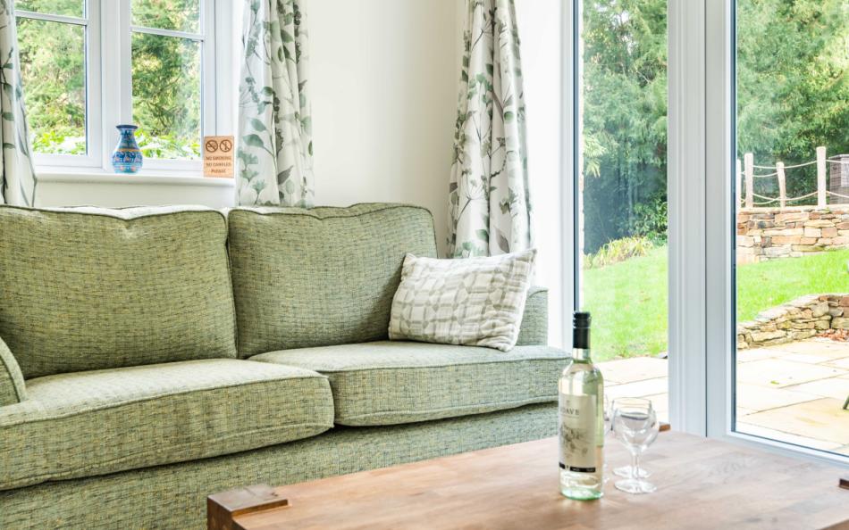 Sofas in the kitchen sitting area at Clanacombe Lodge 