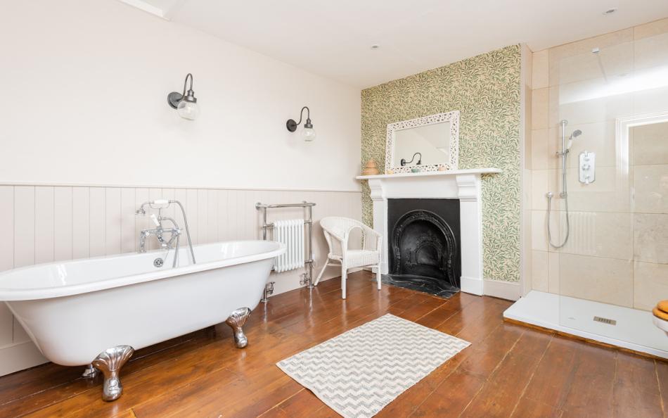Family bathroom with roll top bath at Higher Sutton