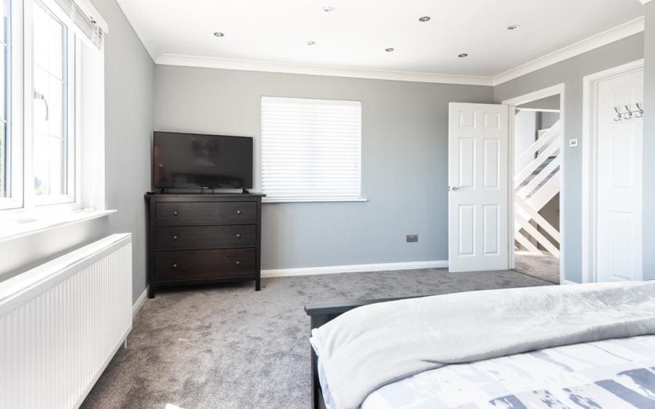 Master bedroom with TV at 1 crestfields