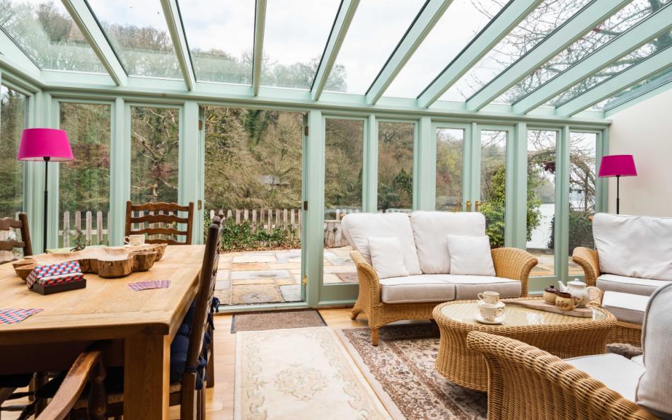 Conservatory with dining and seating at Perchwood Shippon