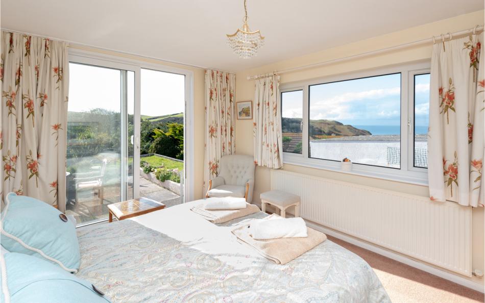 The master bedroom with double bed at Devon House