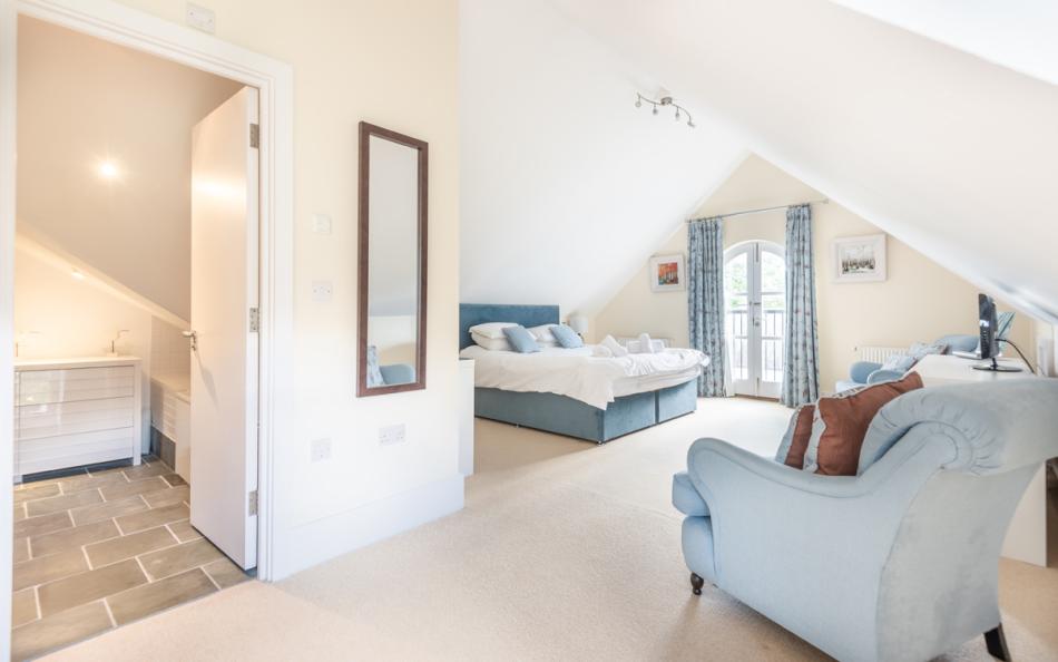 Another view of the master bedroom and en suite at 11 Combehaven 