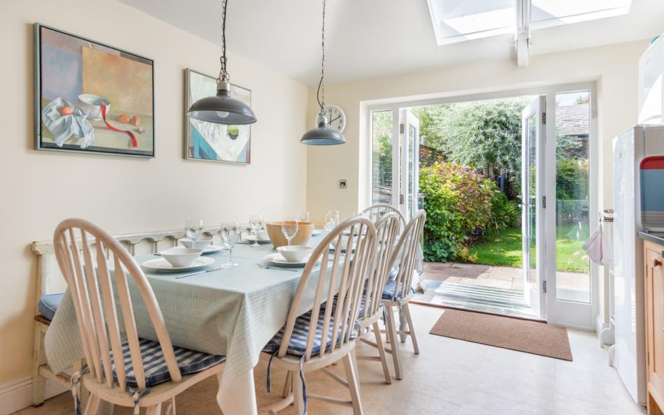 Dining table and seating for 8 guests at Dunedin Cottage