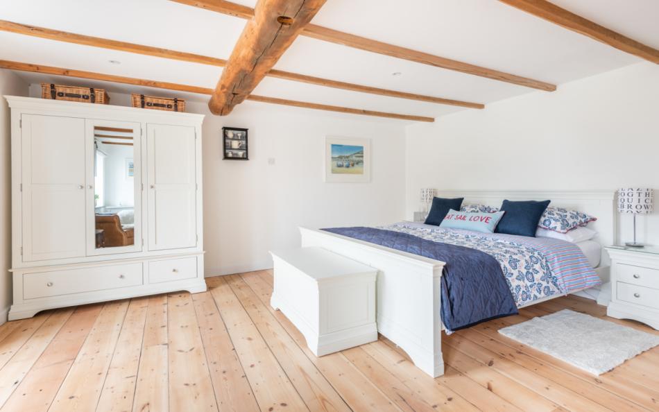 Bedroom 1 with access to terrace at Pleydon Meadow