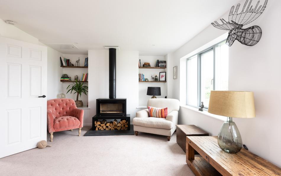 The lounge with log burner at Allahoo