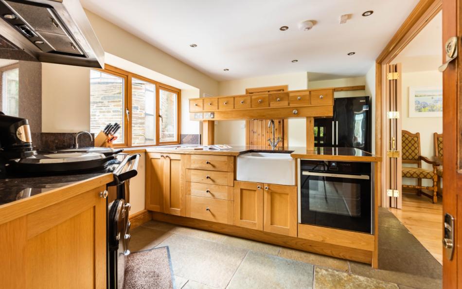 Kitchen with large island at Perchwood Shippon