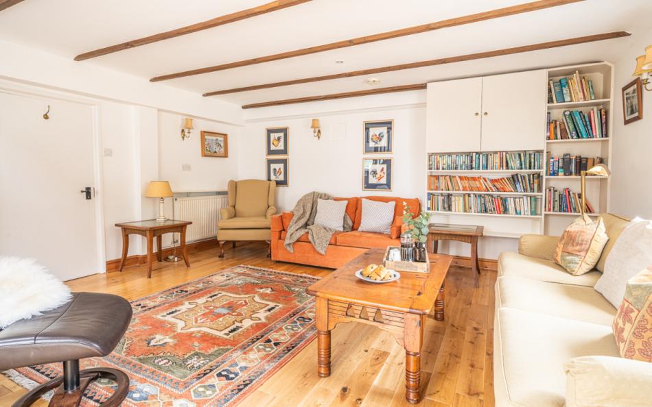 living room book shelves at Moonfleet Cottage