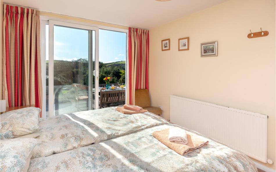 Bedroom 2 with twin beds at Devon House