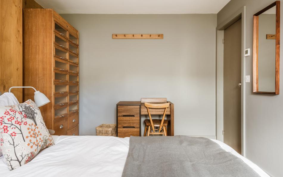 Bedroom 2 with a king size bed at Huccombe Farmhouse 