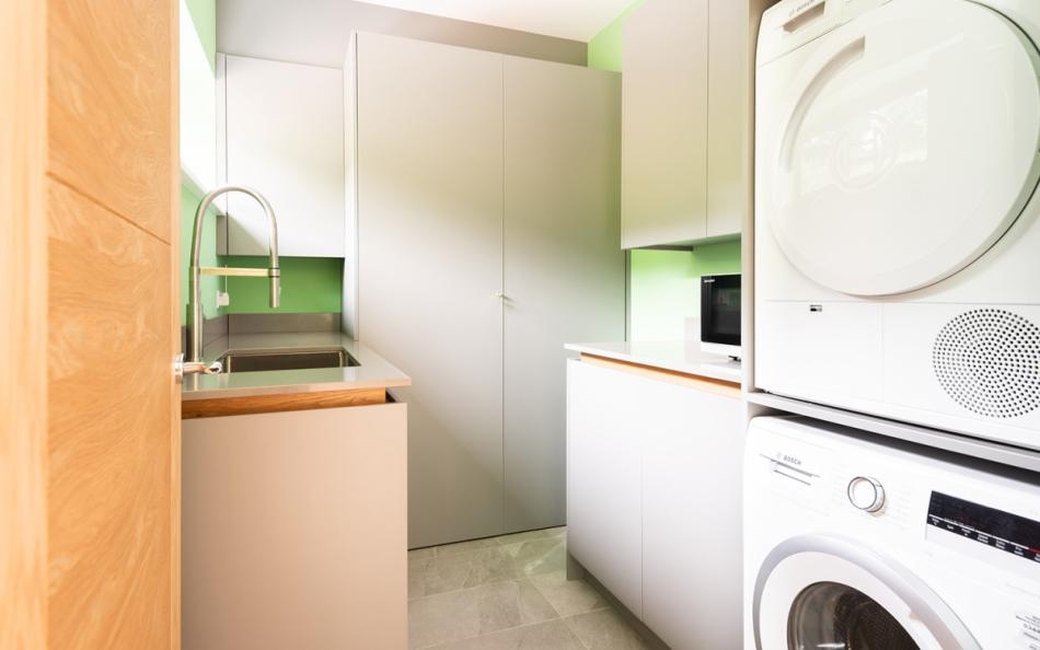 Utility room with washing machine and dryer at Acacia House 