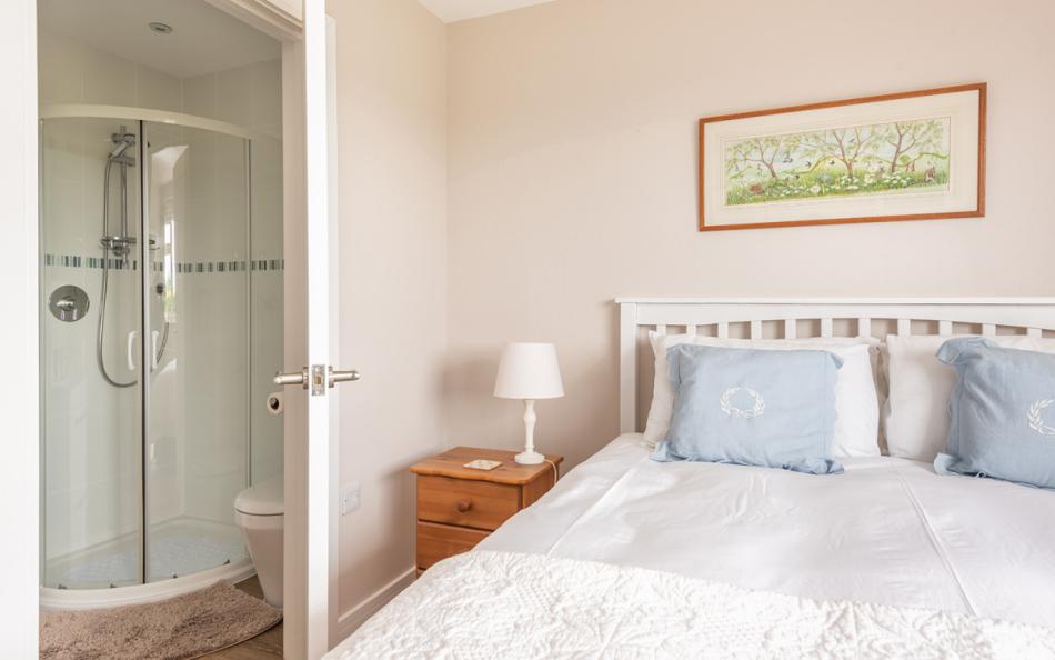 Master bedroom with en suite shower at 10 Old Rectory Gardens