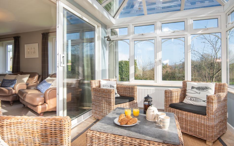 The conservatory gives another space to relax at Clover Cottage