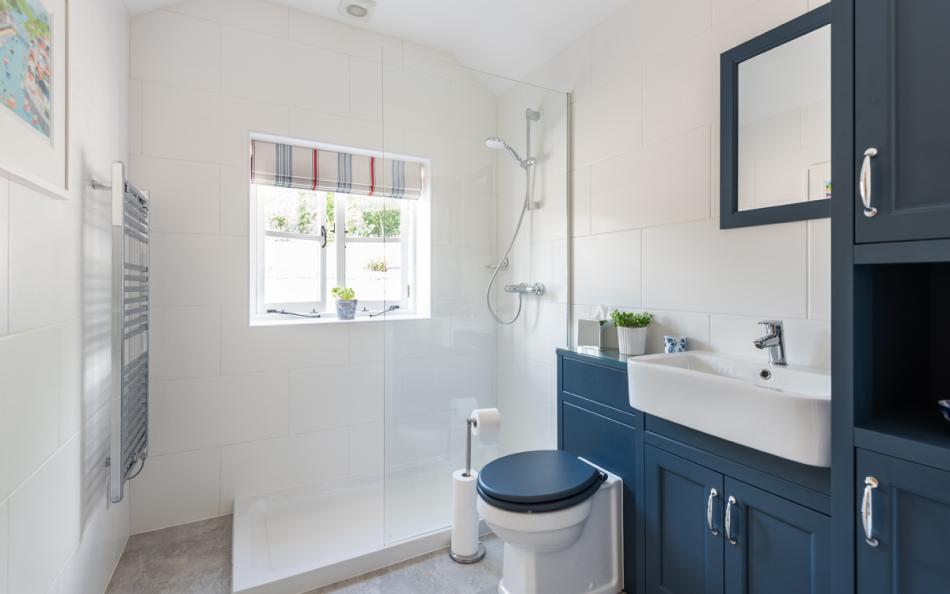 Shower room accessed off utility room at Pleydon Meadow