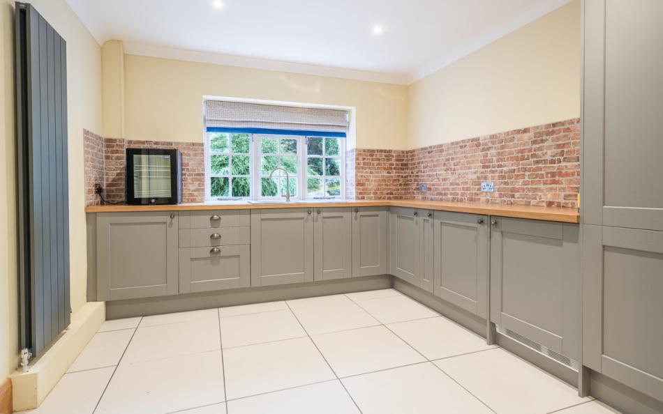 Utility room with cloakroom attached at Rhododendron House