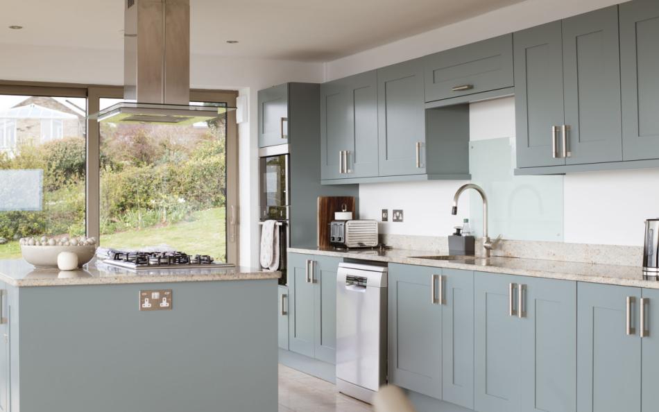 The contemporary kitchen enjoys sea views at Horizons 