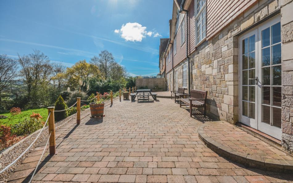 patio area length of the house at Rhododendron House