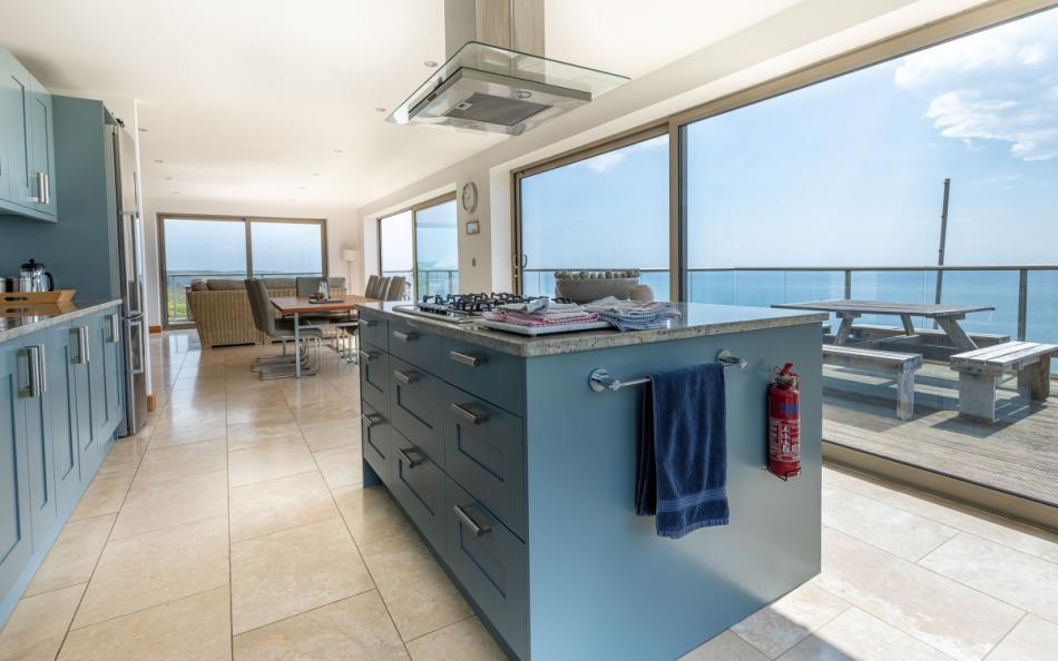 Modern, pretty kitchen with views over the country and out to sea at Horizons 