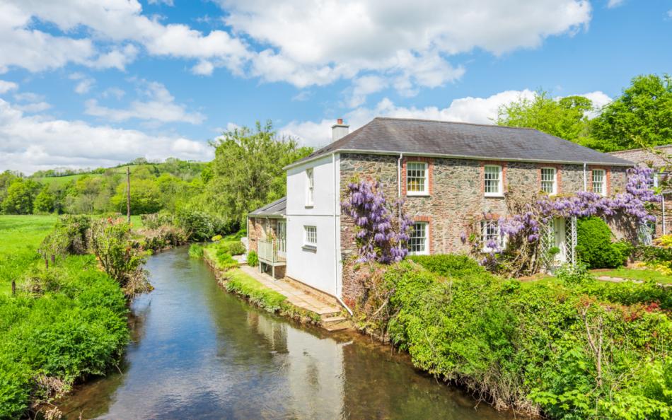 Bow Bridge House next to the river