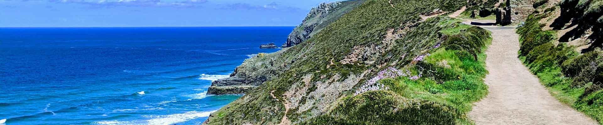 Large holiday cottages available near St Agnes in Cornwall close to beautiful beaches and coastal walks suitable for families and group bookings who enjoy days exploring nearby picturesque locations and taking stunning coastal walks before returning to a luxurious dining area