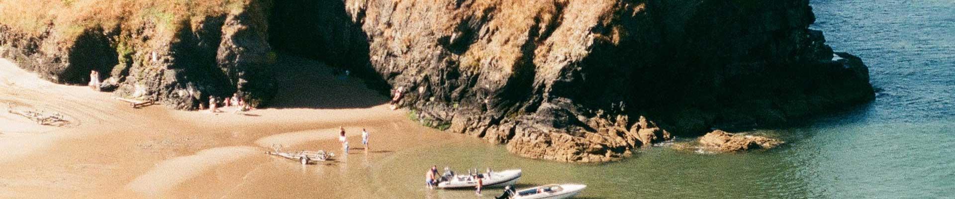 Large holiday cottages available in Llangrannog near to the beach and is perfect for paddling in the sea and boat rides along the coast