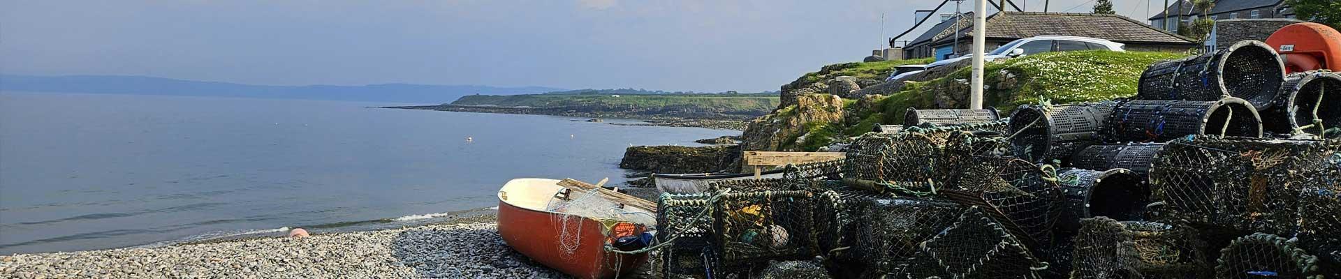Discover large holiday cottages available in Moelfre on The Isle of Anglesey, a lovely fishing village with a sheltered cove